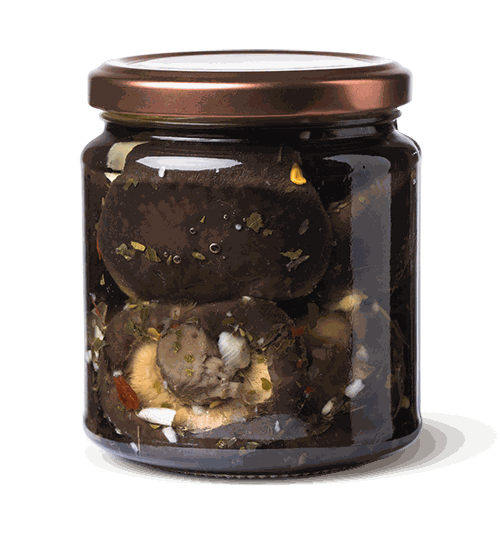 Vaso in vetro con funghi shiitake conditi sott'olio